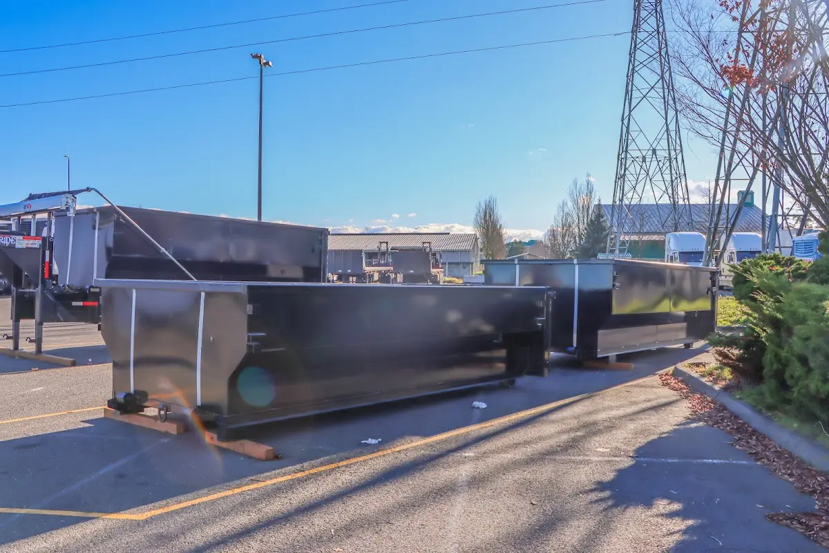 Roll-off dumpster ready for waste disposal at job site for Roll Off Dumpster Rental in Three Oaks